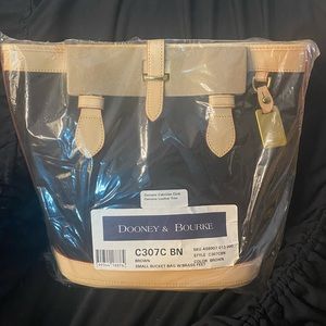 Dooney and Bourke bucket purse w/brass feet tags